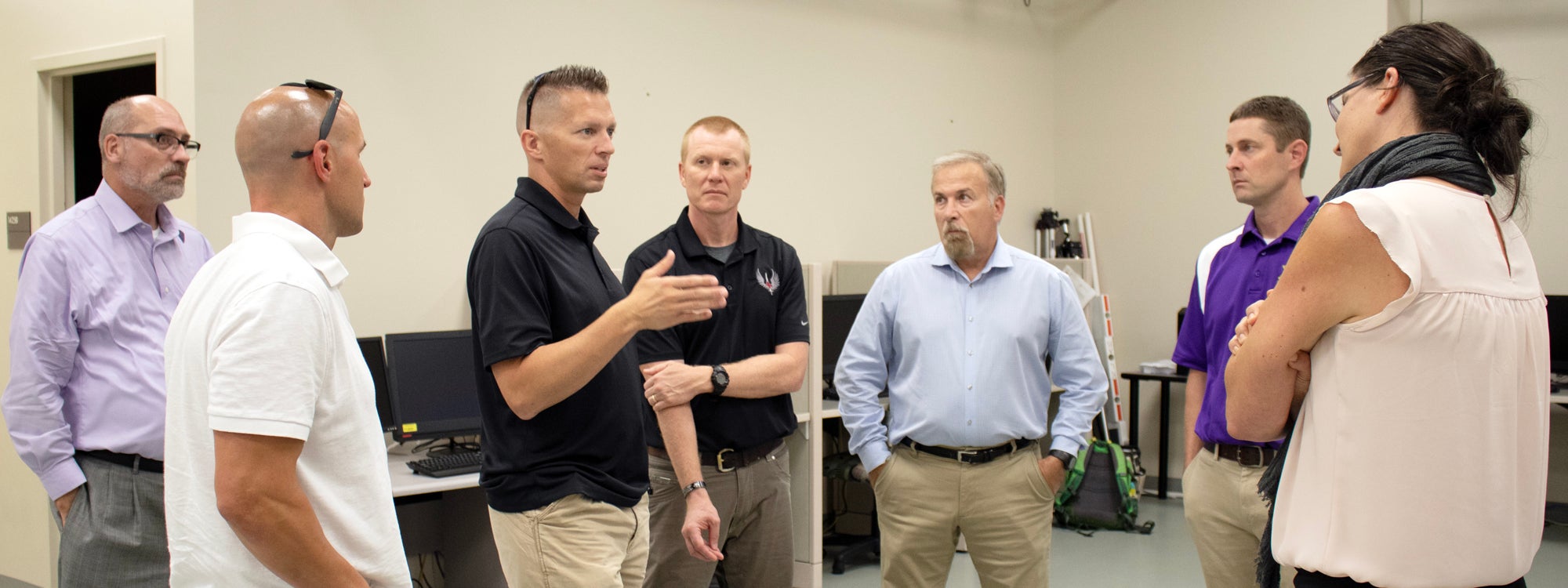 A group from the Air Force 724th Special Tactics Group discusses possible research collaboration opportunities with researchers from East Carolina University’s Human Movement Analysis Lab during a tour on July 23. The group visited several ECU Health and Human Performance and Physical Therapy laboratories to examine assets that could help support their airmen and medical staff.