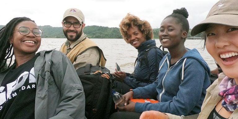 East Carolina University Assistant Professor David Lagomasino, center, travels on a boat with students and research colleages in West Africa. Lagomasino visited the region in August to study the coastal ecosystem which resembles North Carolina’s coast. (Photos contributed by David Lagomasino)
